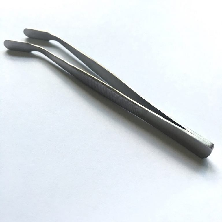 Pince à pouce décalée pour verre de couverture